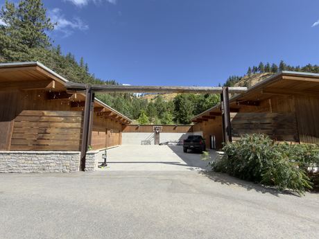 P1 — from the driveway entry, under the log beam